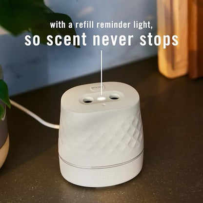Febreze Plug Scent Booster Starter Kit – Air Freshener, Oil Diffuser, Continuous Scent Device, Includes 2 Gain Refills