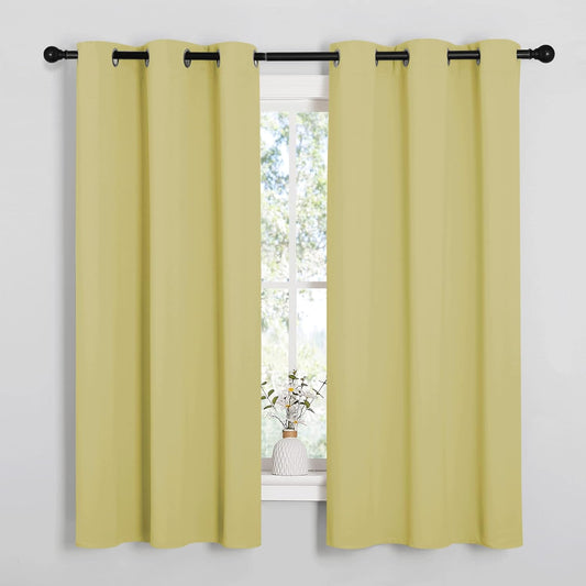 NICETOWN Blackout Window Curtain Panels - Thermal Insulated Grommet Drapes | Paler Yellow, 34x54 Inch (1 Pair)